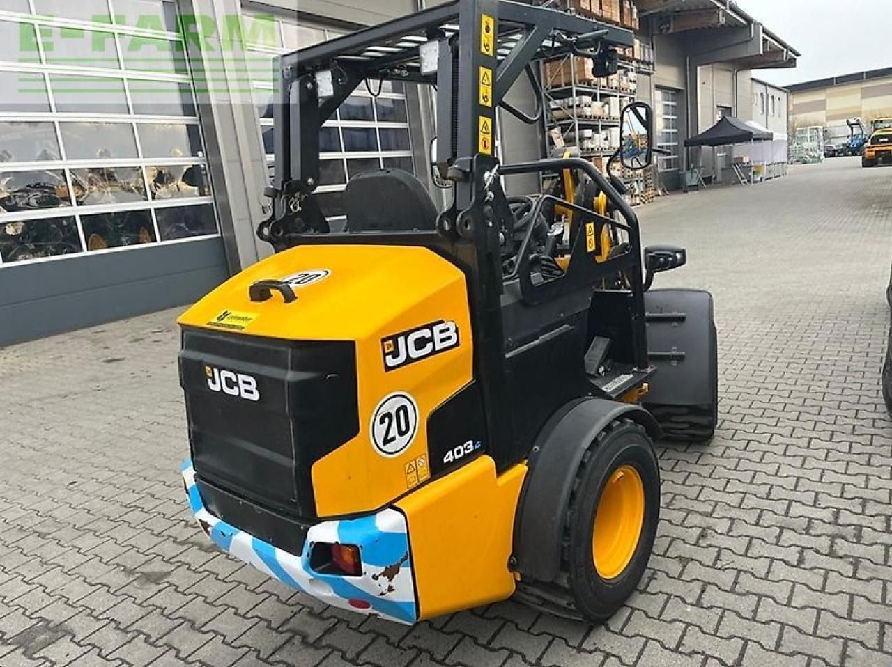 2023 JCB 403 E AGRI mini excavator, rear three-quarter view 2023 JCB 403 E AGRI mini excavator, rear three-quarter view