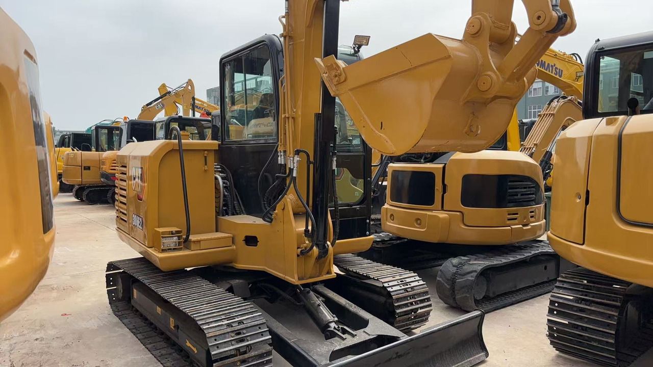 2022 Caterpillar 306E2 mini excavator, rear three-quarter view