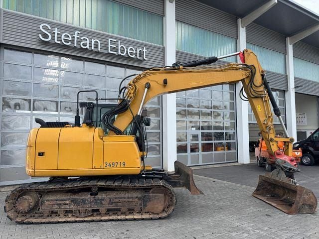 2017 Caterpillar 311FLRR crawler excavator, side profile view