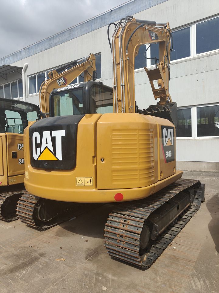 Caterpillar 308E crawler excavator, rear three-quarter view