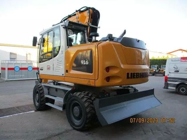 2023 Liebherr A916 Litronic wheel excavator, rear three-quarter view