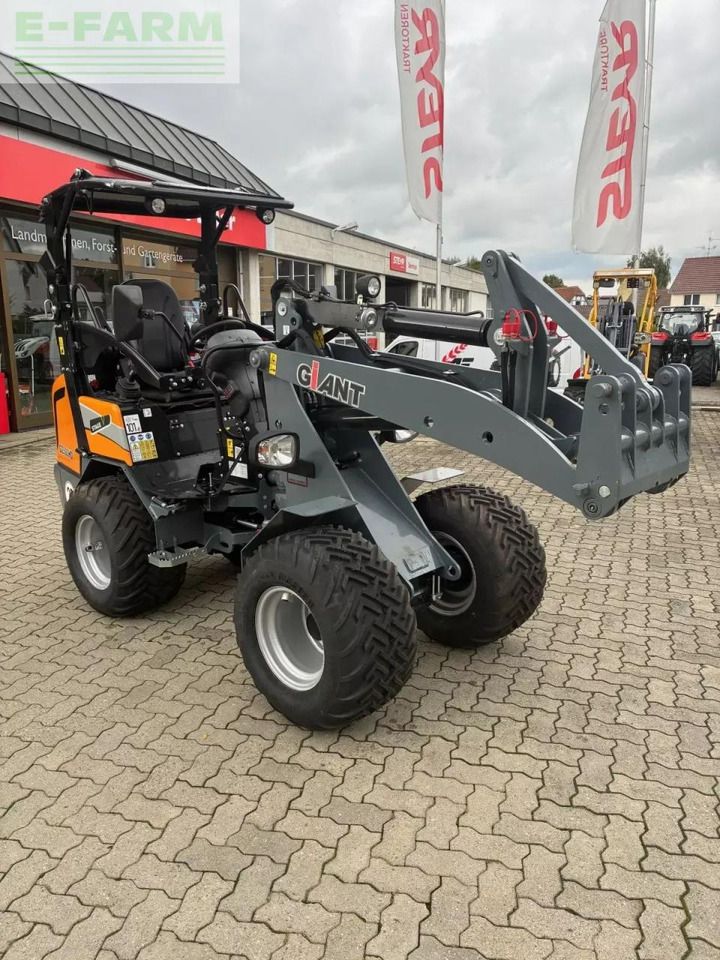 2026 Giant G2500 HD Mini Excavator with gray loader arms extended forward, side view 2026 Giant G2500 HD Mini Excavator with gray loader arms extended forward, side view