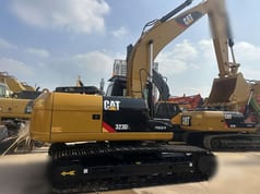 2023 Caterpillar 323DL crawler excavator side view