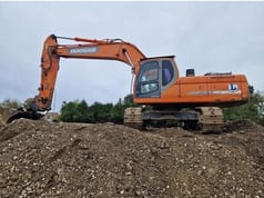 2015 Doosan DX300LC crawler excavator side view
