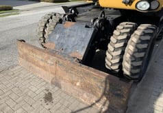 2008 Caterpillar M318D wheel excavator dozer blade view