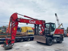 2004 O&K MH 6.6 wheel excavator, front three-quarter view