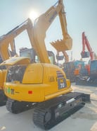 2025 Komatsu PC70 crawler excavator, rear three-quarter view
