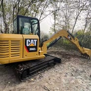 2022 Caterpillar 306E2 mini excavator, rear three-quarter view