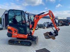 2024 Kubota KX019-4 mini excavator, side view 2024 Kubota KX019-4 mini excavator, side view