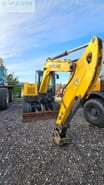 2018 New Holland E60C crawler excavator, front three-quarter view