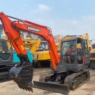 2019 Doosan DX55 crawler excavator, front three-quarter view