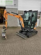 2024 CASE CX 25 EV mini excavator, side view