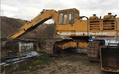 1982 Demag H55 crawler excavator side view