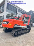 2022 Doosan DX225LCA crawler excavator, rear three-quarter view