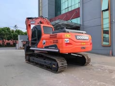 2023 Doosan DX225LC-9C crawler excavator, rear three-quarter view 2023 Doosan DX225LC-9C crawler excavator, rear three-quarter view