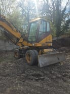 2002 Hydrema M800 wheel excavator, side profile view