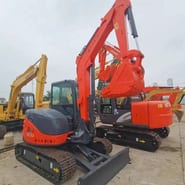 2023 Hitachi ZX60U mini excavator, rear three-quarter view 2023 Hitachi ZX60U mini excavator, rear three-quarter view