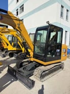 2020 Caterpillar 306E2 mini excavator, front three-quarter view