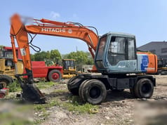 1993 Hitachi EX100WD wheel excavator side view 1993 Hitachi EX100WD wheel excavator side view