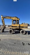 1995 Caterpillar 212B FT Wheel Excavator