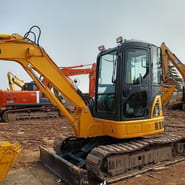 2023 Komatsu PC-55MR mini excavator, side view 2023 Komatsu PC-55MR mini excavator, side view