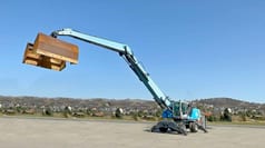 2011 Terex MHL360 material handler, side view with raised boom