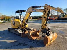 2018 Caterpillar 305E2 crawler excavator, rear three-quarter view