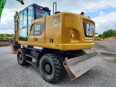 2018 Caterpillar M316F wheel excavator, rear three-quarter view 2018 Caterpillar M316F wheel excavator, rear three-quarter view