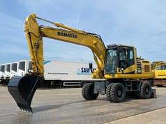 2019 Komatsu PW180-11 wheel excavator, side view