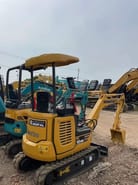 2020 Komatsu PC18MR mini excavator, rear three-quarter view 2020 Komatsu PC18MR mini excavator, rear three-quarter view