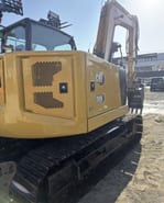 2021 Caterpillar 308CR crawler excavator, rear three-quarter view 2021 Caterpillar 308CR crawler excavator, rear three-quarter view