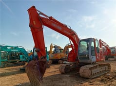 2021 Hitachi ZX135US crawler excavator, front three-quarter view