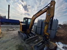 2022 Caterpillar 304 crawler excavator, front three-quarter view