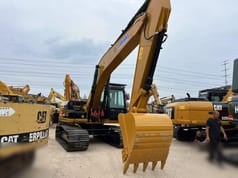 2022 Caterpillar 320D2 Raupenbagger, Front-Dreiviertelansicht