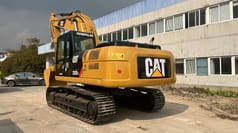 2023 Caterpillar 325D2L crawler excavator, rear three-quarter view