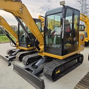 2024 Caterpillar 306E2 mini excavator, front three-quarter view
