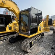 2024 Komatsu PC70-8 mini excavator, front three-quarter view