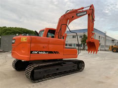2022 Doosan DX140LC crawler excavator, rear three-quarter view