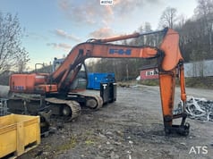 1998 Hitachi EX165 crawler excavator, side view