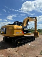 2025 Caterpillar 320D2 crawler excavator rear three-quarter view