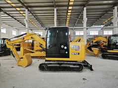 Caterpillar 307E2 mini excavator side view Caterpillar 307E2 mini excavator side view