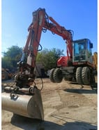 2006 Atlas 1305 wheel excavator, front three-quarter view