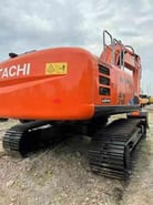 2023 Hitachi ZX210 crawler excavator, rear three-quarter view