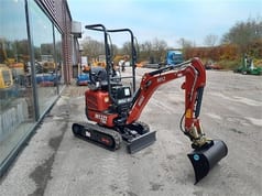 Mole M12 mini excavator, three-quarter view