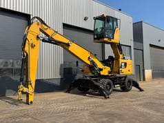2019 Caterpillar MH3024 material handler, side view