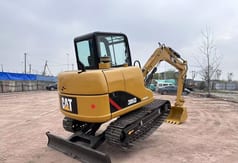 2021 Caterpillar 306D crawler excavator, rear three-quarter view