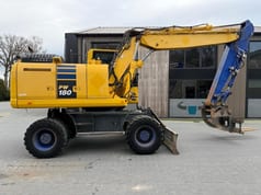 2018 Komatsu PW180-10 wheel excavator, side profile view