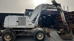 2005 CASE WX165 wheel excavator, side profile view