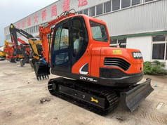 2025 Doosan DX75-9C crawler excavator, rear three-quarter view