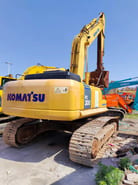 2018 Komatsu PC300-7 crawler excavator, rear three-quarter view 2018 Komatsu PC300-7 crawler excavator, rear three-quarter view
